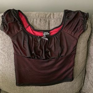 Black blouse with a maroon under lay